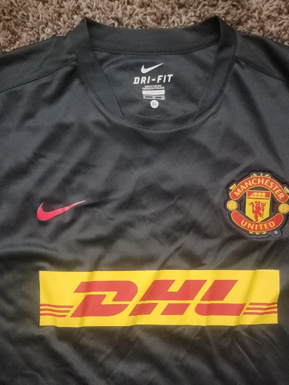 Nike 2011-2013 Manchester United training jersey, featuring a DHL